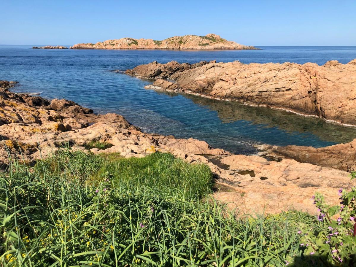 Borgo Spiaggia Isola Rossa Buitenkant foto
